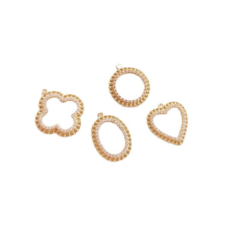 14-teiliges geometrisches Anhänger-Set in Goldton: Pfirsichherz, Kleeblatt, Zirkel, Charms Creolen