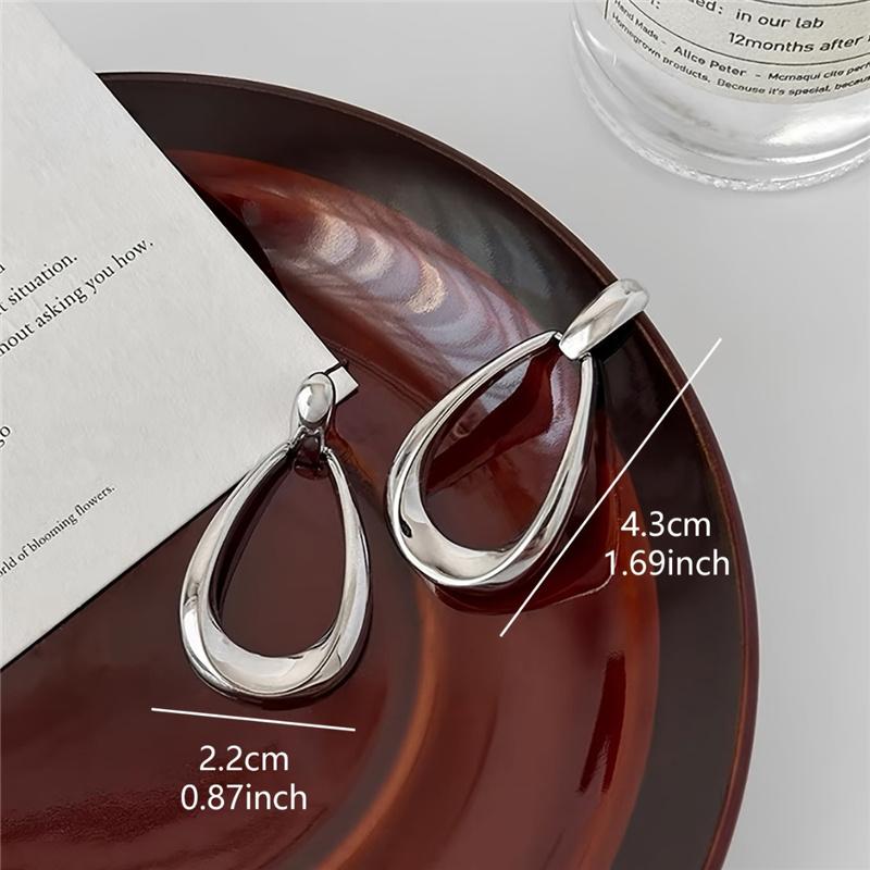 Простые геометрические овальные серьги — фото 8