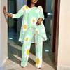 Women Plus Size Three Quarter Sleeve Round Neck Irregular Hem Printed Top Wide Leg Pants Two Piece Set