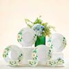 Northern Scenery Bone China 8-Piece Kapok Flower Dinnerware Set