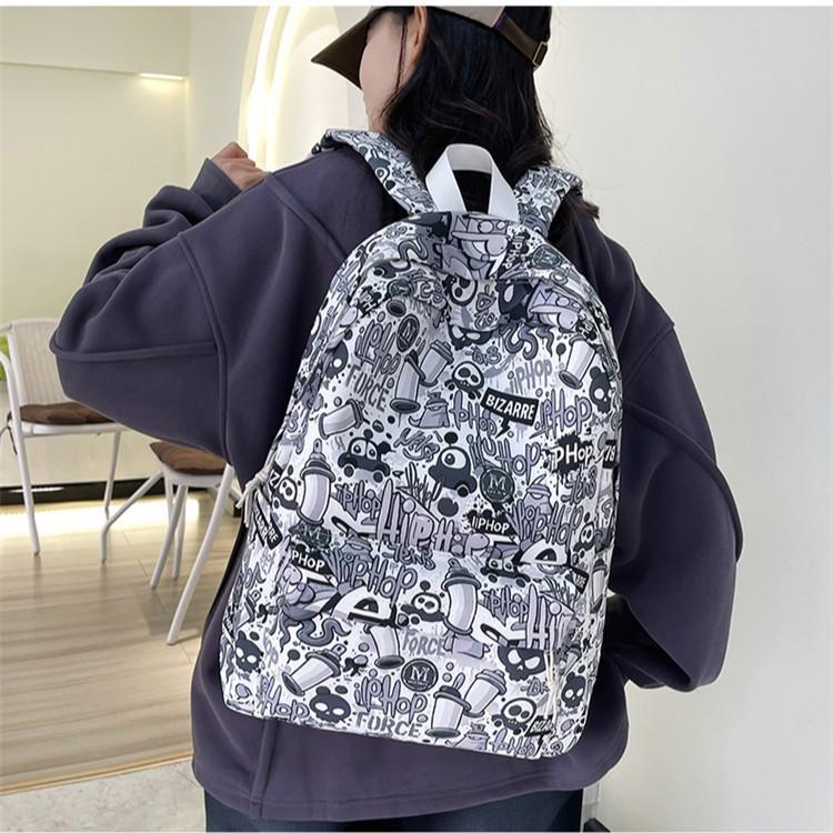 Schulranzen Großhandel Schulranzen Damen Koreanische Version ins Mittelschüler High-School-Schüler Rucksack Graffiti Kontrastfarbe