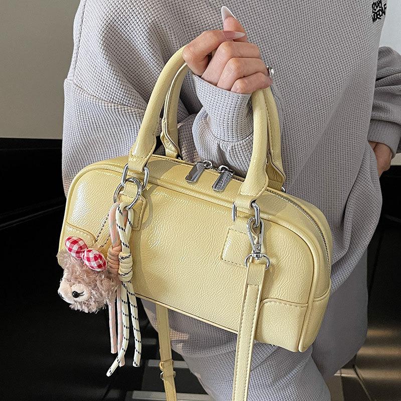 2025 Spring New Korean Version Simple Portable Bowling Bag Women's Versatile Foreign Style Commuter Premium Sense Messenger Bag