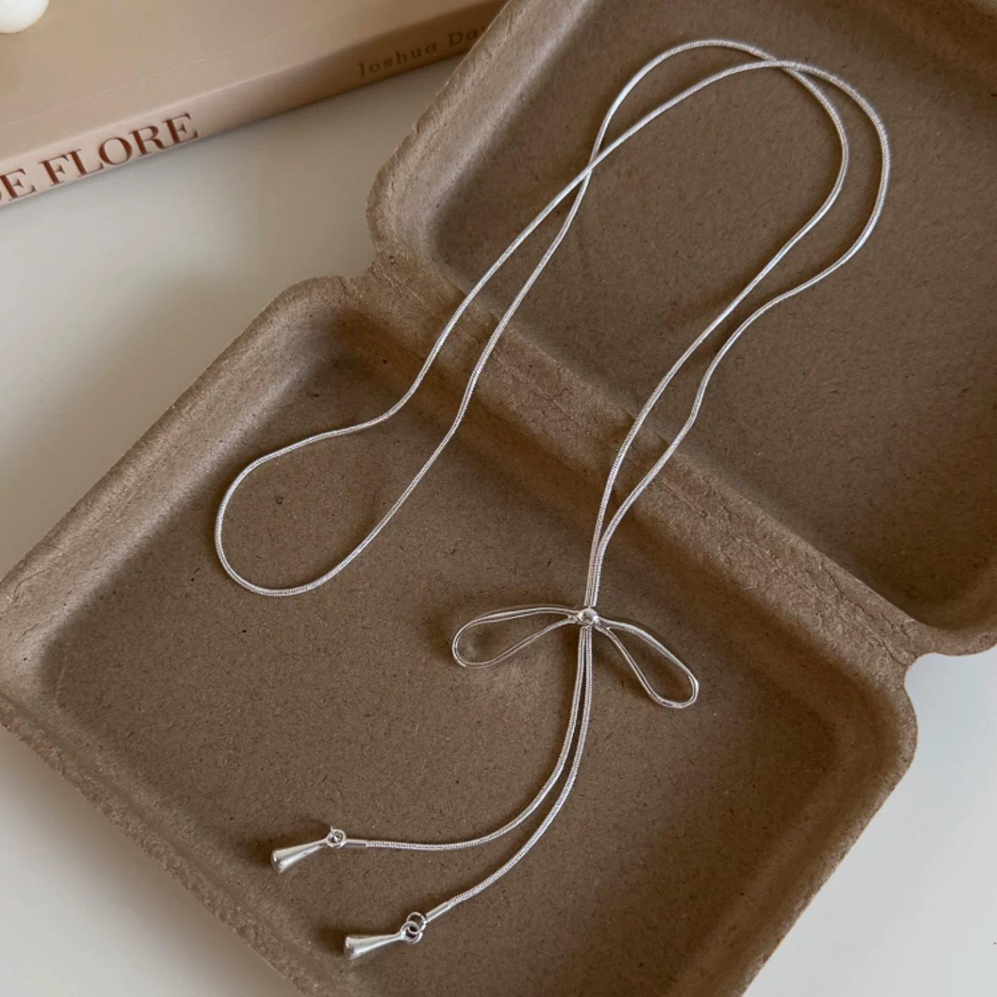 Никелированное серебро с позолотой, ожерелье с кисточкой-бантом - Универсальная длинная выдвижная цепочка-свитер для женщин