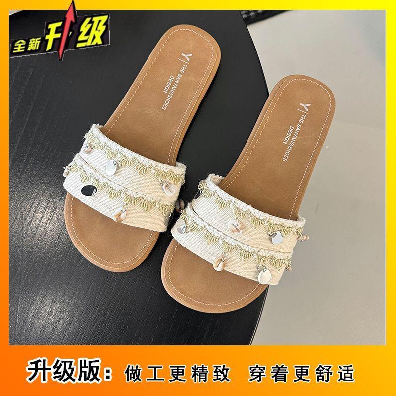 Seaside vacation wind one-word casual with skirt shoes 2025 new flat-bottomed cross with cool slippers women's summer wear