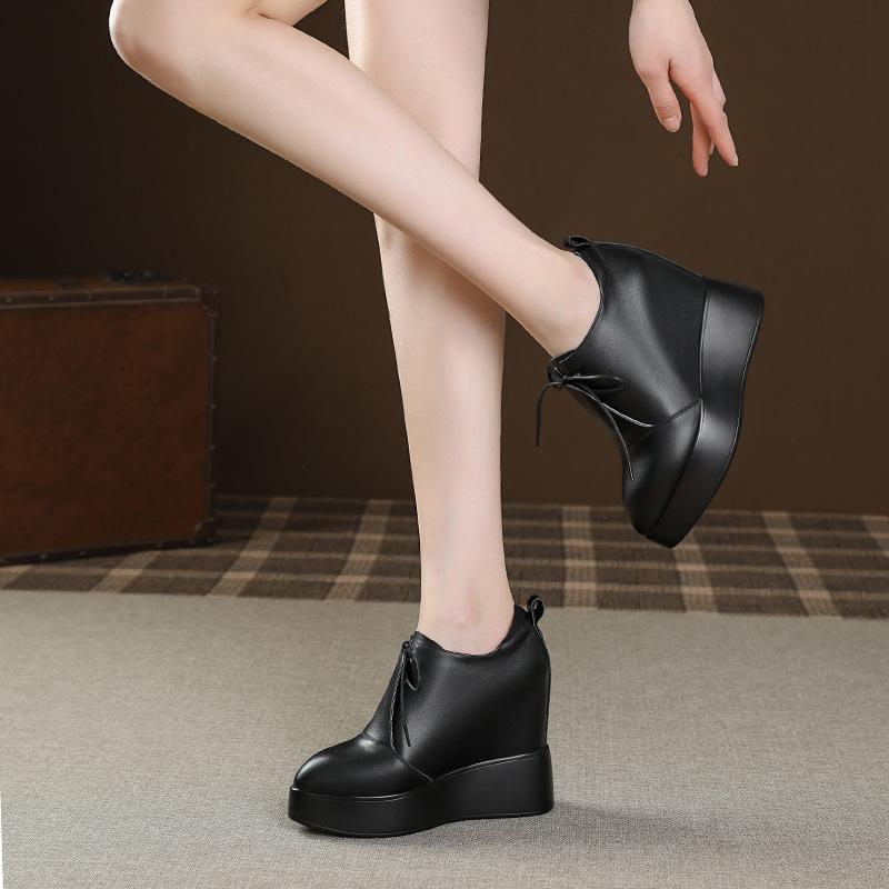 Wedge heel thick-soled leather single shoes women's 2025 new 12cm inner height increase pointed waterproof front strap-on deep mouth single shoes