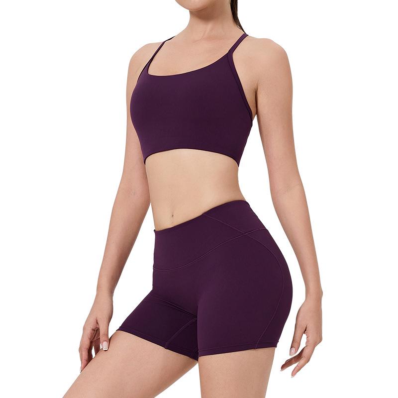 Women's High-Waist Fitness Set: Sports Bra with Pads, Beautiful Back Design, and Three-Point Peach Lift Shorts for Yoga and Pilates.