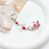 Fashionable Christmas Santa Claus Flocking Keychain With Star Bowknot Soft Plush Charm Accessory for Bags and Phones