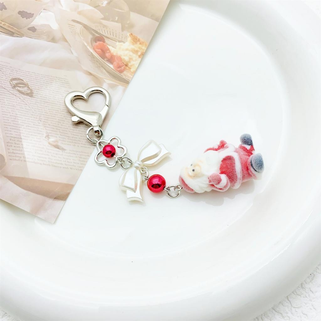 Fashionable Christmas Santa Claus Flocking Keychain With Star Bowknot Soft Plush Charm Accessory for Bags and Phones