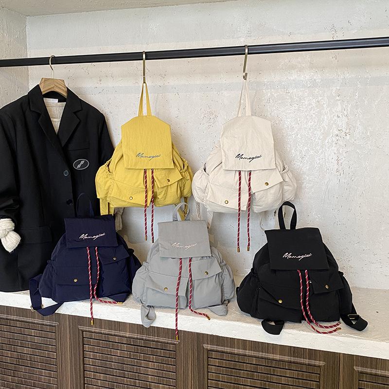 New Korean version of student schoolbag women's high-value commuter travel bag solid color large-capacity casual backpack women