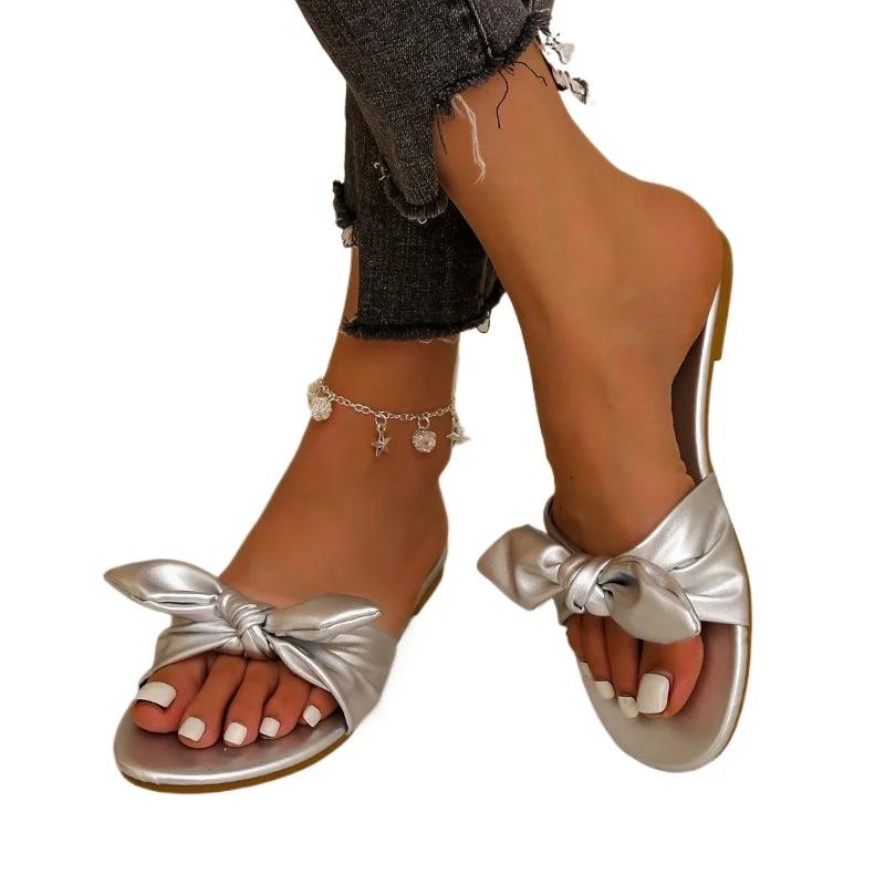 Модне взуття для жінок 2024 Гарячий розпродаж Жіночі шльопанці з відкритим носком Літні з бантом Однотонні Вуличні Повсякденні Пляжні Плоскі Зручні Шльопанці