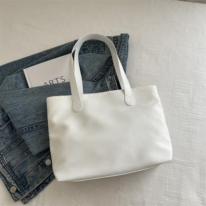 2025 New Fashion Versatile Shopping Bag Large Capacity Handbag Travel Storage Bag Light Commuter Tote Women's Bag