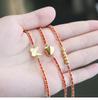 Pulsera Roja de Año Nuevo Tejida a Mano para Mujer con Cuentas Doradas - Regalo Tai Sui