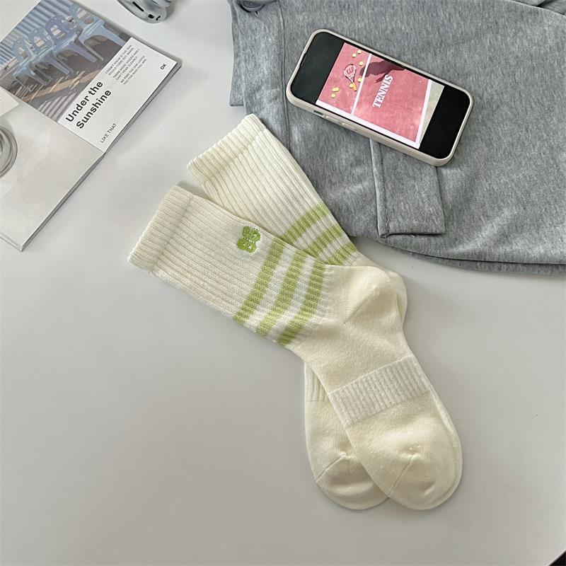

Unisex Mid-Calf Sports Socks - Trendy European & American Style, Thick Thread, Solid Color, Slouch Fit for Couples. One Size