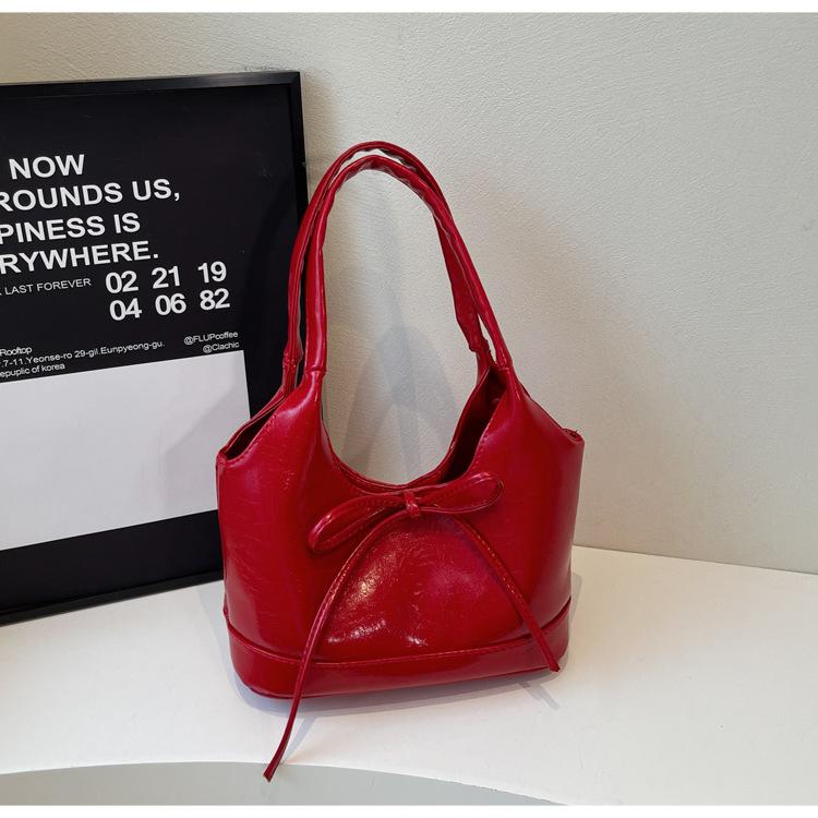 

2025 Korean version of the new bow niche women s bag, simple commuter literary shoulder bag, large-capacity underarm tote bag Burgundy Small