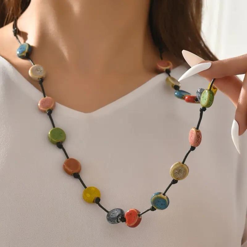 JMXD-European and American retro wax rope necklace colored ceramic round sweater chain long versatile dopamine beaded necklace versatile