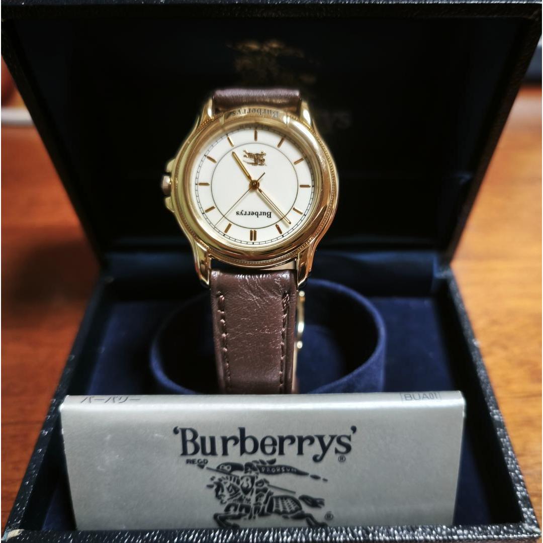 Used Burberrys watch quartz gold color