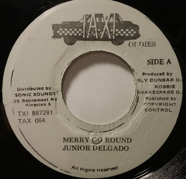 

7inch Record JUNIOR DELGADO - Merry Go Round / Fort Augustus TAX064 Taxi Oldies Jamaica Reggae, Ska & Dub Used