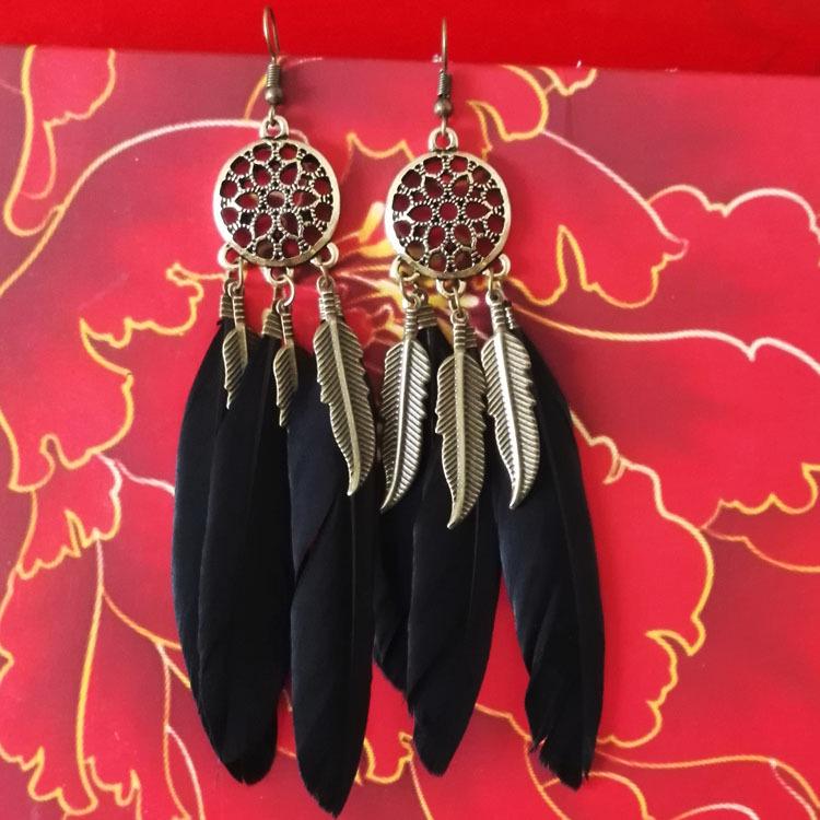 

Hollow Vintage Leaf Feather Drop Earrings Bohemian Feathers Long Design Hollow metal Earrings Ladies Zircon