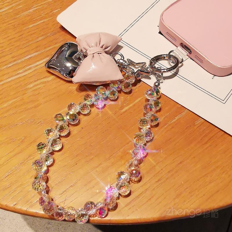 Small fragrance bow tie, love mobile phone hanging chain, ins mobile phone case, pendant, beaded chain, short fashion women's wrist ornament