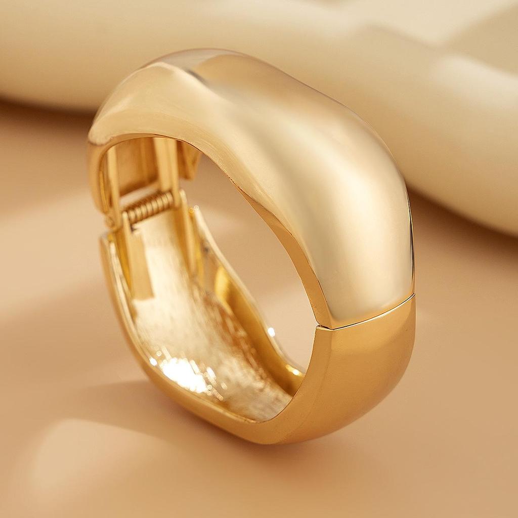 Bold Geometric Metallic Wide Bangle with Heavy Industry Design