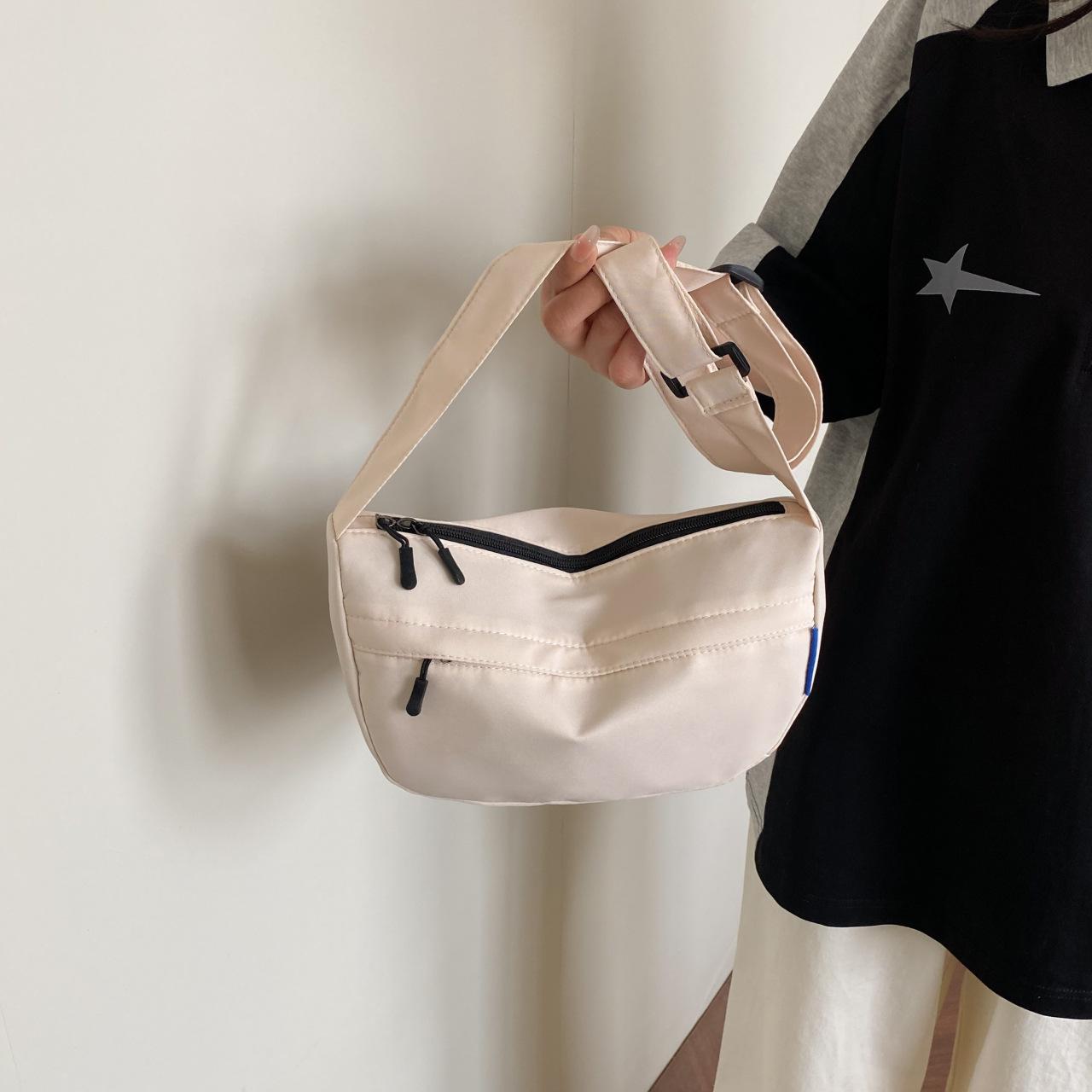 

2025 Lightweight & Spacious Korean-Style Crossbody Bag: Simple, Fashionable, Casual, & Ideal for College Commuting брудно-білий