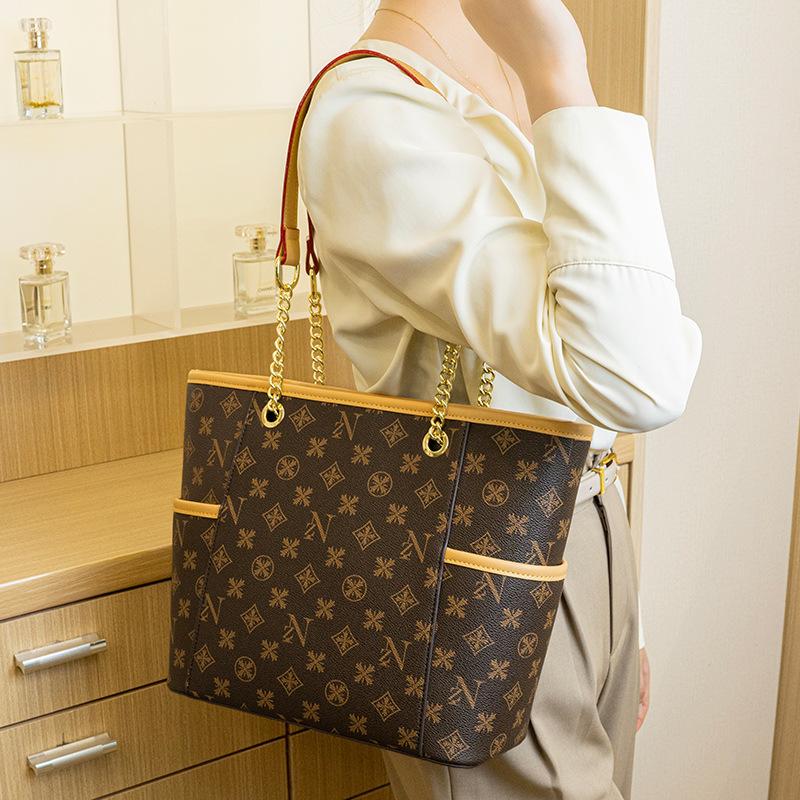 Trendige Einkaufstasche mit großem Fassungsvermögen für Pendlerinnen, modische und vielseitige bedruckte Handtasche, Retro-Tragetasche mit Unterarmkette