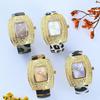 Moderne tonnenförmige Damenuhr Gold Iced Out Zifferblatt mit Leopardenarmband Luxus Quarz-Armbanduhr für Damen