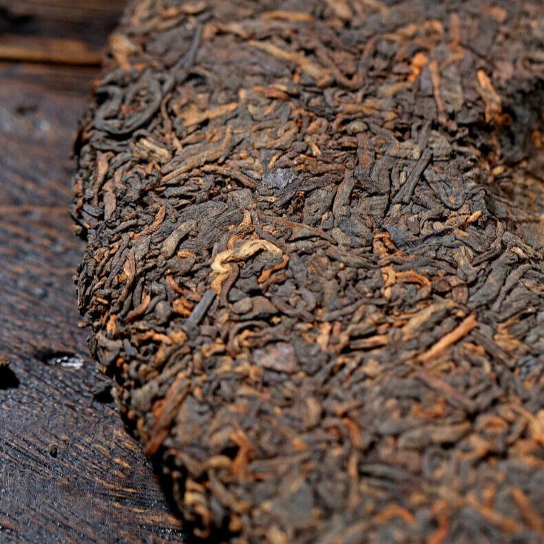 Menghai Yunnan Pu'er Ripe Tea Xinyihao Ancient Tree Seven Seed Cake 357g Tea