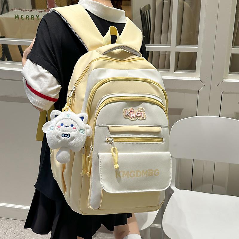 Large capacity backpack junior high school high school student casual backpack women's fashion travel high value spine protection student schoolbag