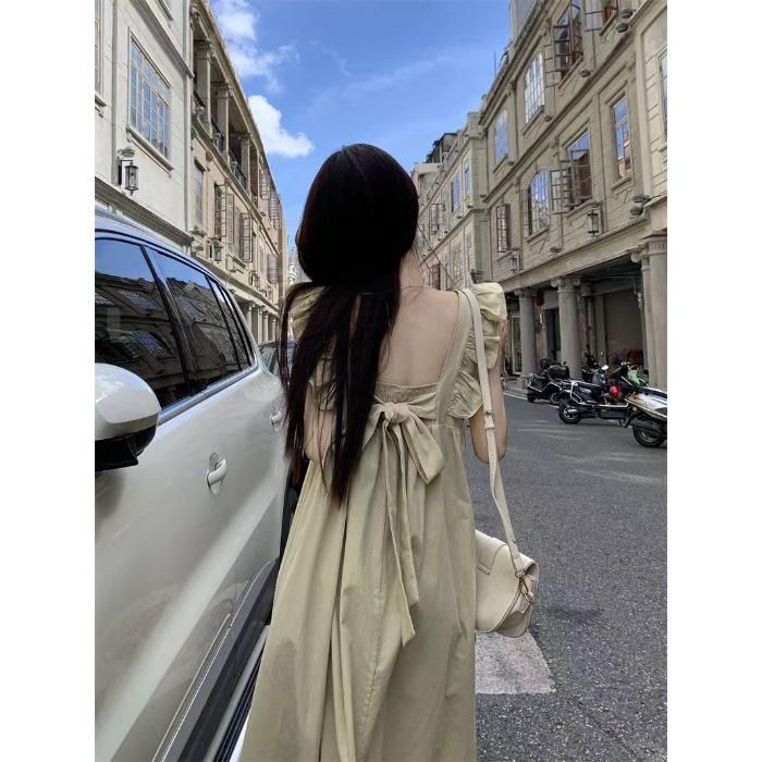 

Sweet backless flying sleeves bow strap dress summer new vacation meat cover thin a word long skirt 2XL абрикосовий