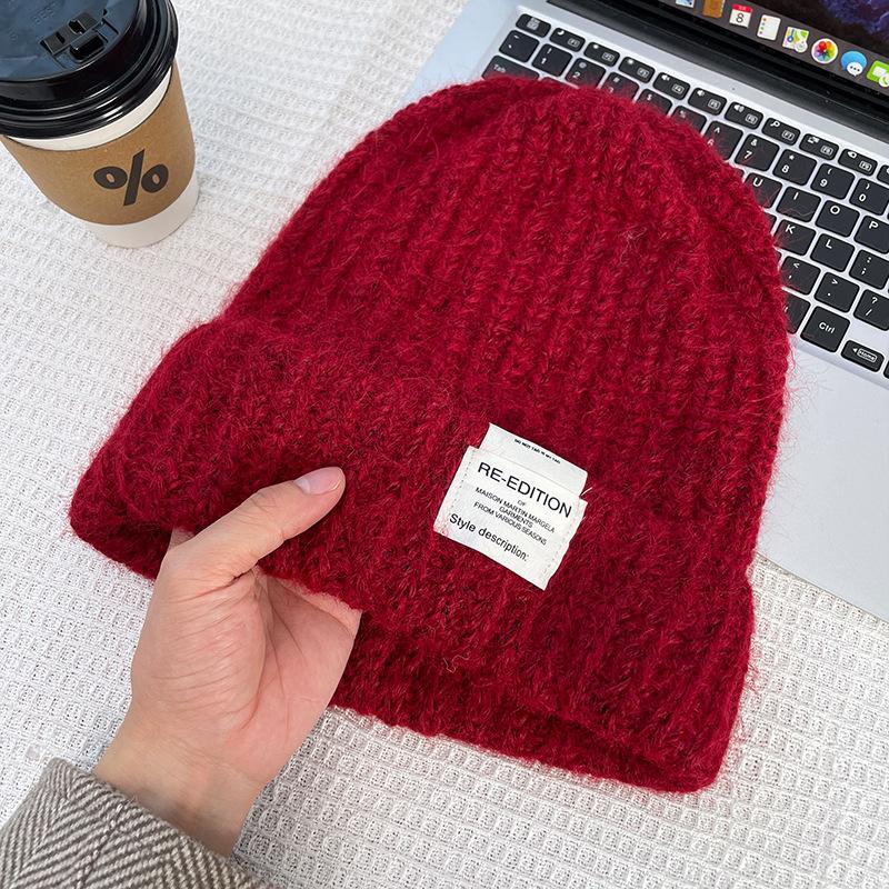 

Шапки из овечьей шерсти Женские шерстяные шапки Вязаные шапки Осень и зима Универсальная защита ушей Шапки-пуловеры для мужчин и женщин Модные