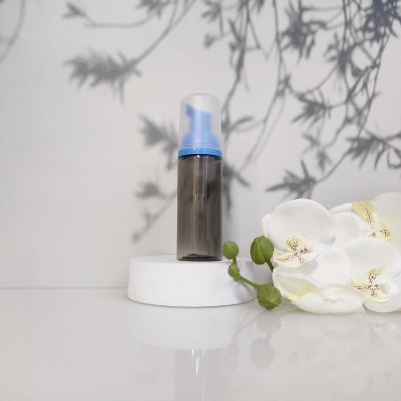 Available 60ml Transparent Black Foam Mousse Bottle for Face Wash and Travel-friendly Cosmetic Packaging.