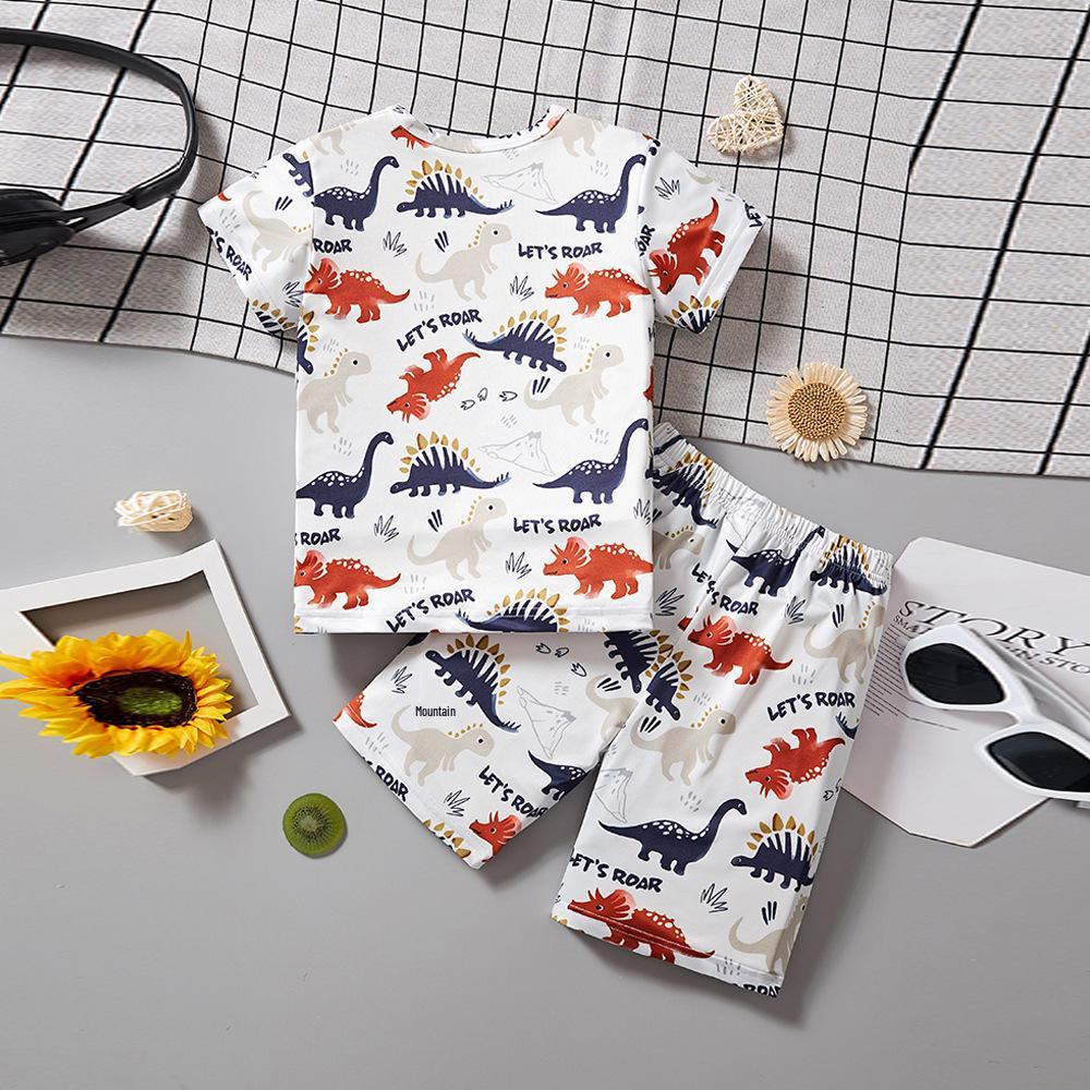 Completo estivo trendy per bambini con dinosauri a cartoni animati, manica corta e pantaloncini