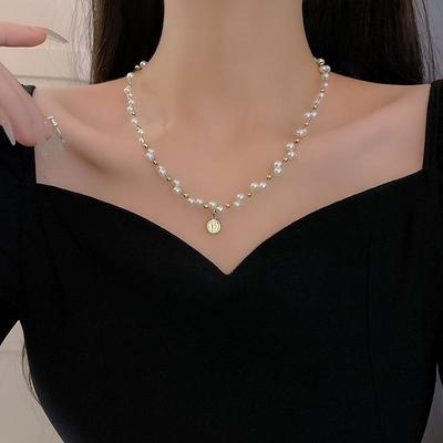 European & American Retro Pearl Pendant Necklace - Luxury Niche Design for Women