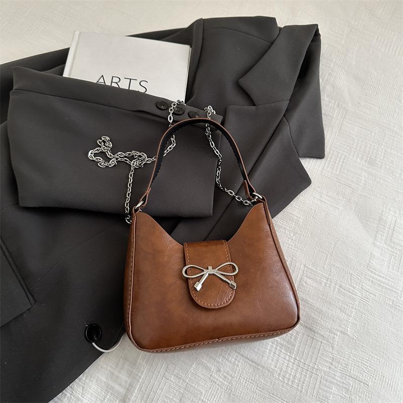 

Simple women s bag 2025 new Korean version of personalized ins trendy shoulder underarm bag texture foreign commuter baguette bag