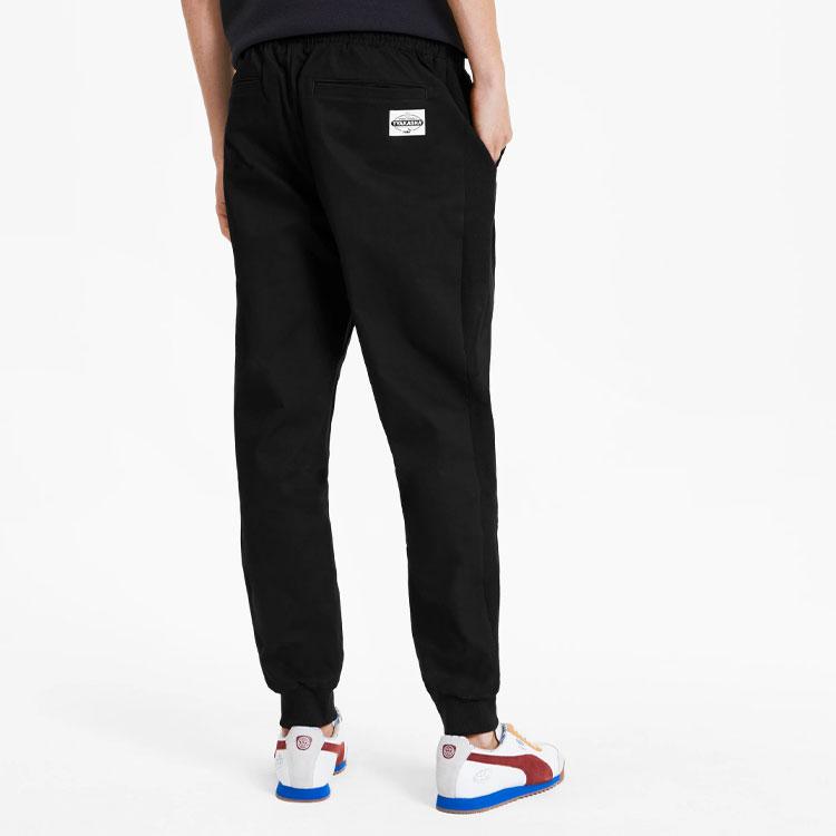 Puma Pantaloni casual țesuți X Tyakasha Bărbați Pantaloni negri 595560-01