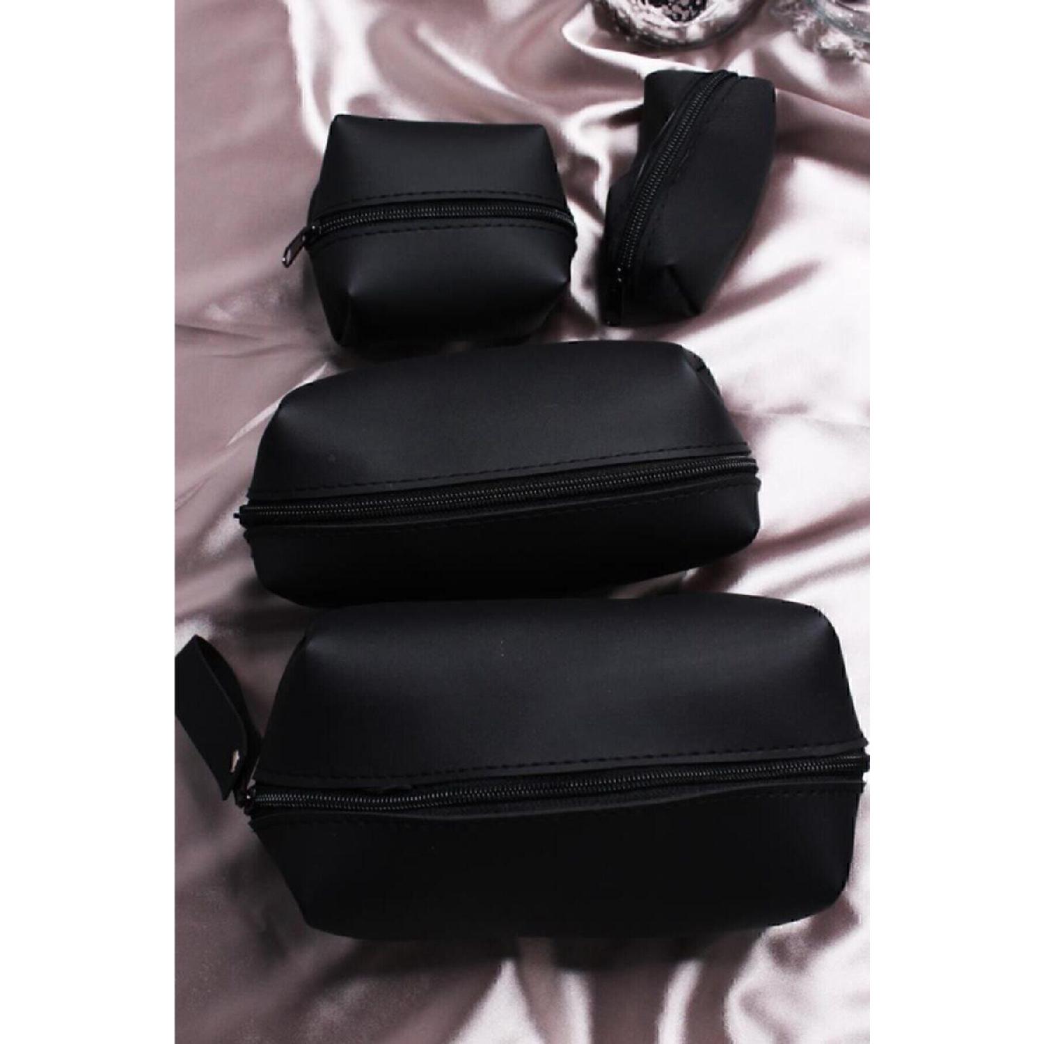 

4-piece Black Makeup Bag