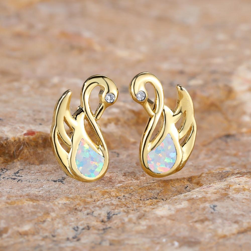 Модные серьги-лебеди с кристаллами циркона — фото 6