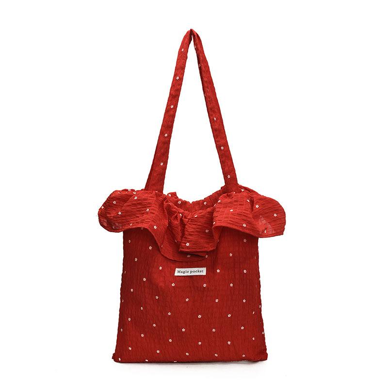 Korean version of Harajuku ins small flower embroidery contrasting color women's shopping bag new simple and exquisite shoulder armpit bag