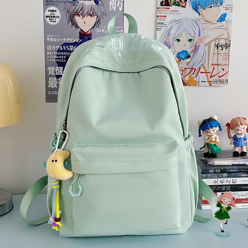 

Japanese simple and versatile large-capacity solid-color campus schoolbag women s new summer light commuter shoulders single bag зелений