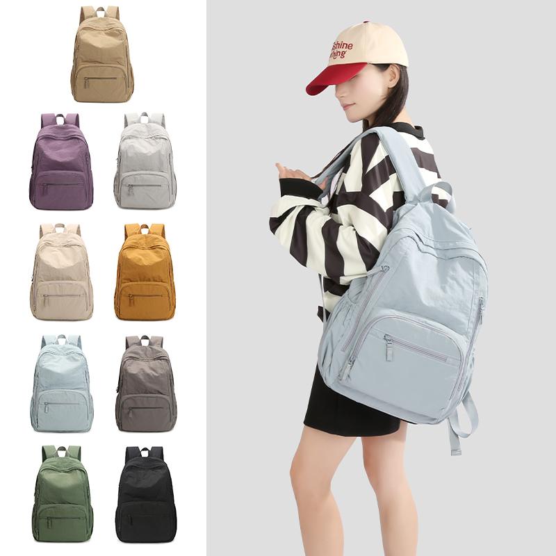Ryggsäck i enfärgat dam lätt utomhusryggsäck stor kapacitet student skolväska