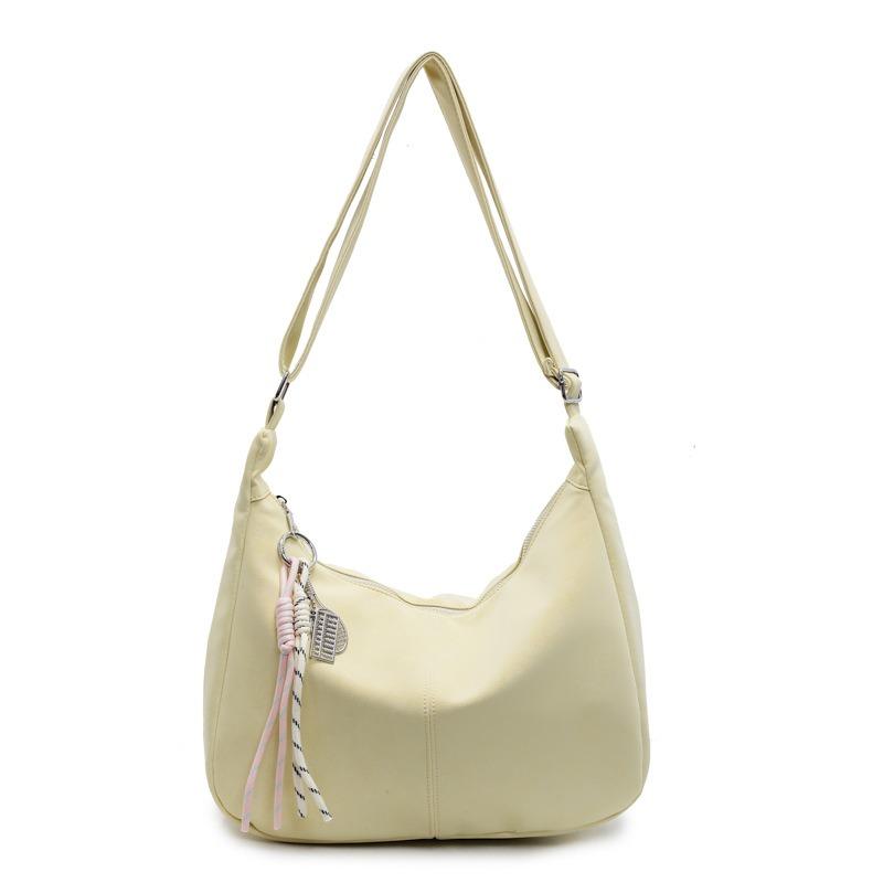 Niche cream soft waxy tote bag casual versatile student commuting large-capacity messenger bag woman