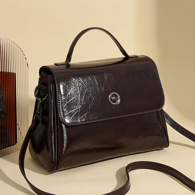 Frühling Neue Mode Einfache Damen Handtaschen PU Leder Leichter Luxus High-End Gefühl Unifarben Damen Tragetasche Vielseitige Pendler Schnalle Umhängetaschen