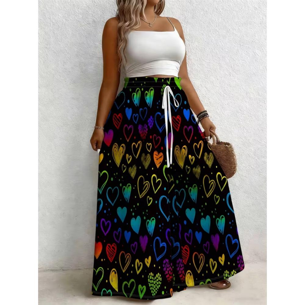 Large size women's printed loose wide leg pants, elegant with pockets, suitable for vacation and daily wear