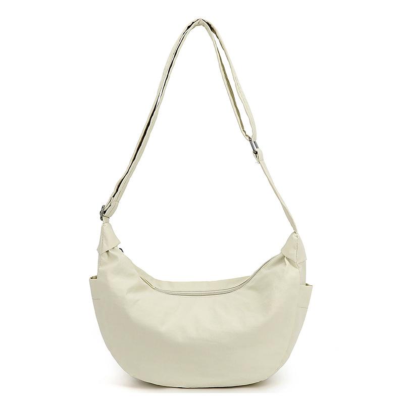 Yiran Jewelry Ring Lazy Wind Fashion Crescent Jiaozi Tas Japanse eenvoudige casual nylon schoudertas forenzentas Joker Girl Messenger Bag