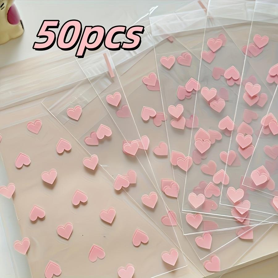 

50 шт. Многоразовые розовые самоклеящиеся пакеты в форме сердца | Идеально подходят для подарков на вечеринку, поздравительных открыток и упаковки небольших подарков