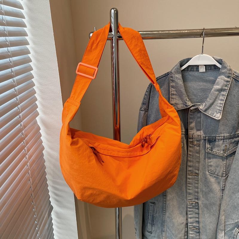 Large capacity nylon bag shoulder messenger bag new urban simple dumpling bag solid color casual student bag