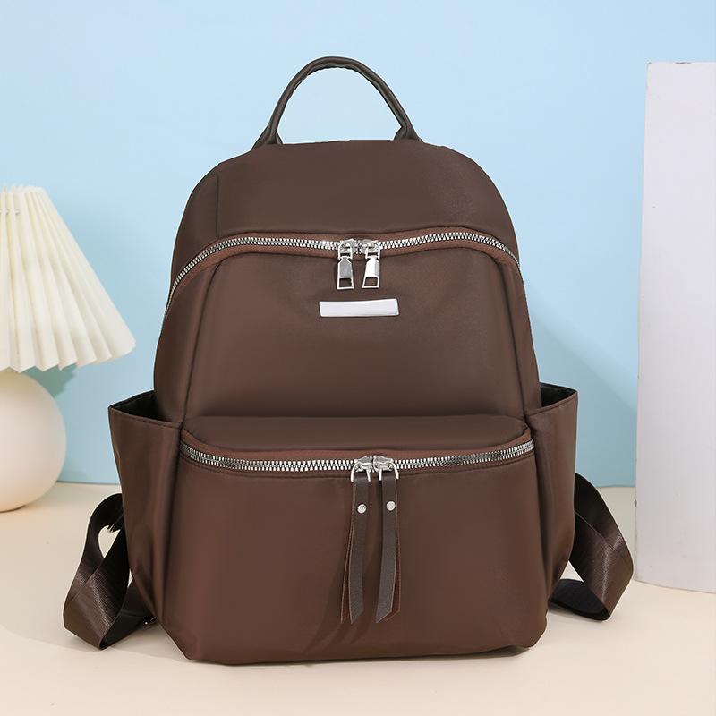 Schooltas Mode Casual Nieuwe Nylon Rugzak Lichtgewicht Grote Capaciteit Veelzijdige Mode Tas voor Uitgaan Reizen