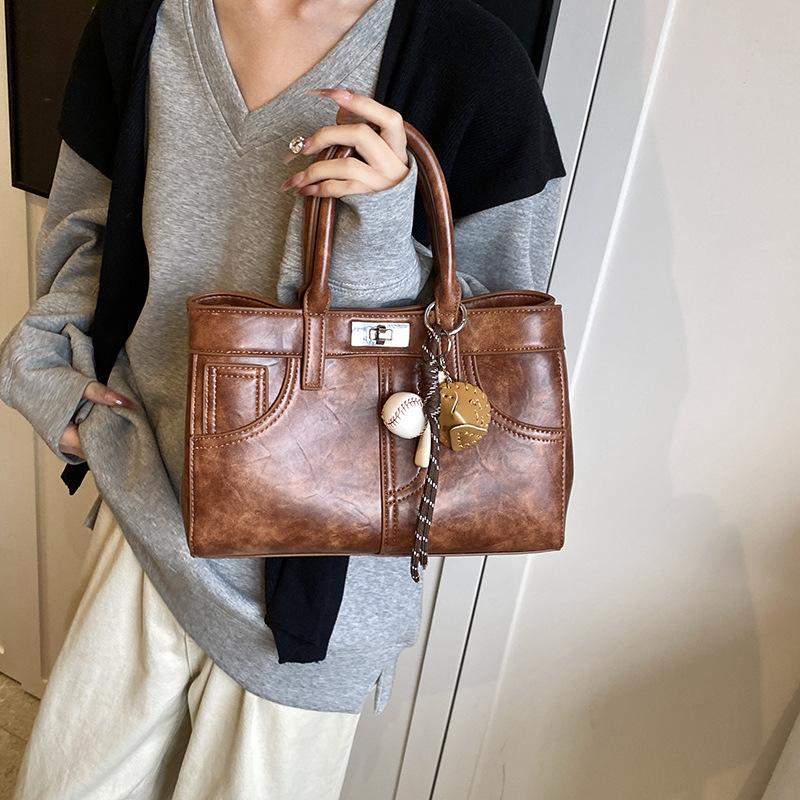 

Премиальная ретро сумка цвета майард браун женская 2025 новая универсальная сумка-мессенджер портативная сумка-тоут 29*8*20