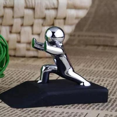 Pequeño y hombre de aleación de Zinc con Bases de goma antideslizantes Tope de puerta seguro anticolisión Tope de puerta de goma Diseño novedoso decorativo